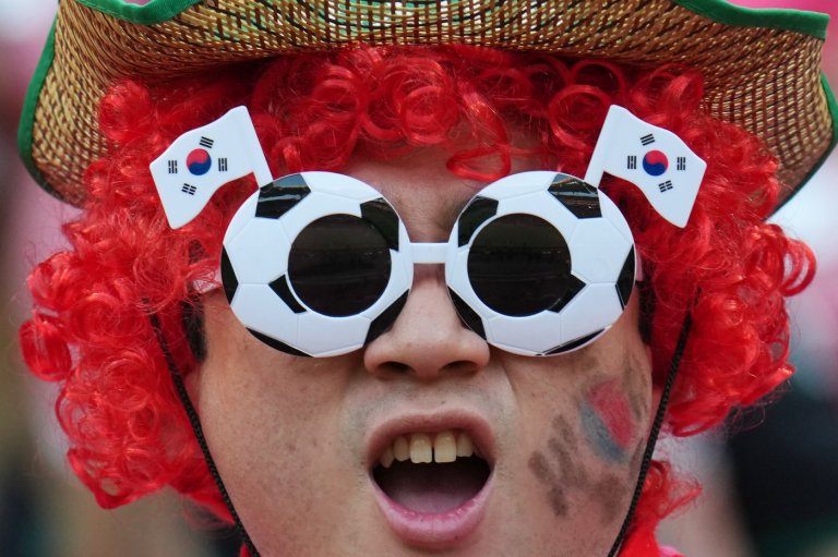 World Cup fans flood stadiums and fan zones with dazzling costumes, facepaint and flags - in photos | iNFOnews.ca