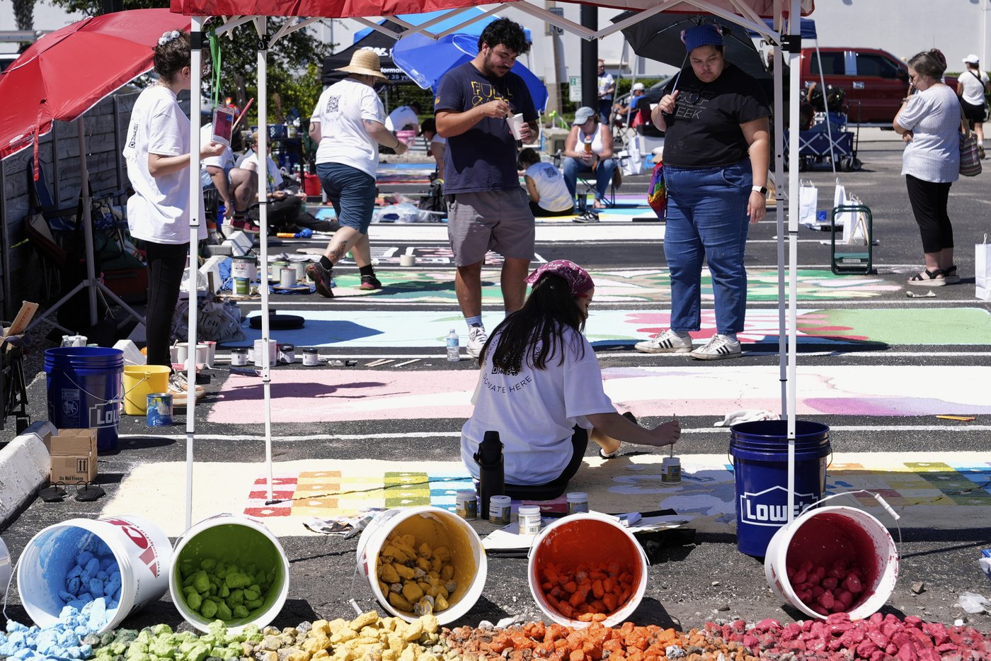 Parking spots used as colorful protest against Florida crackdown on rainbow crosswalks | iNFOnews.ca
