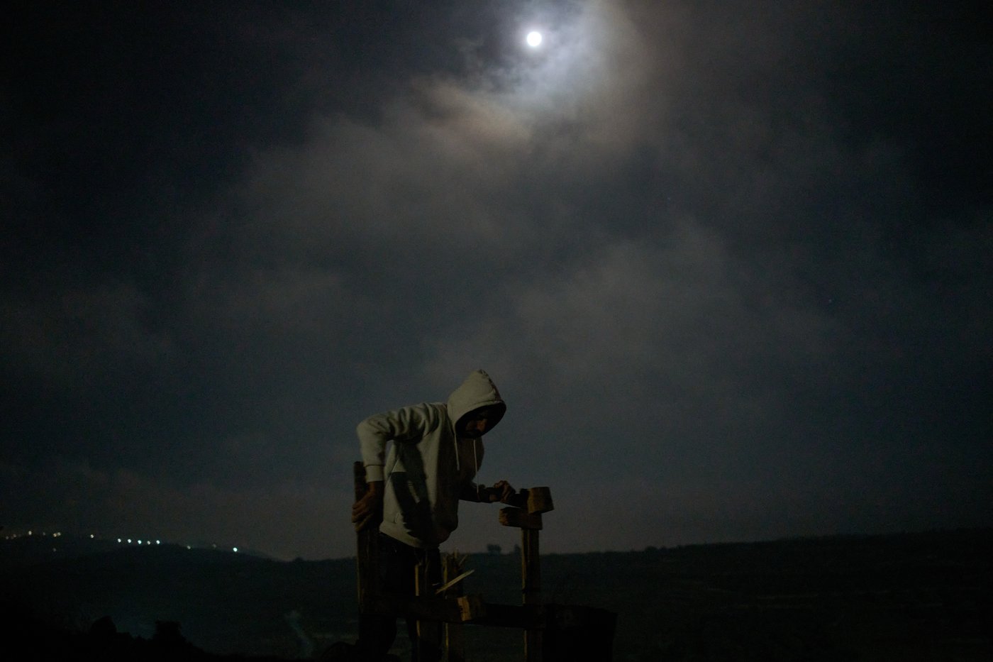 Photos show West Bank Palestinians keeping watch at night as settler violence grows | iNFOnews.ca