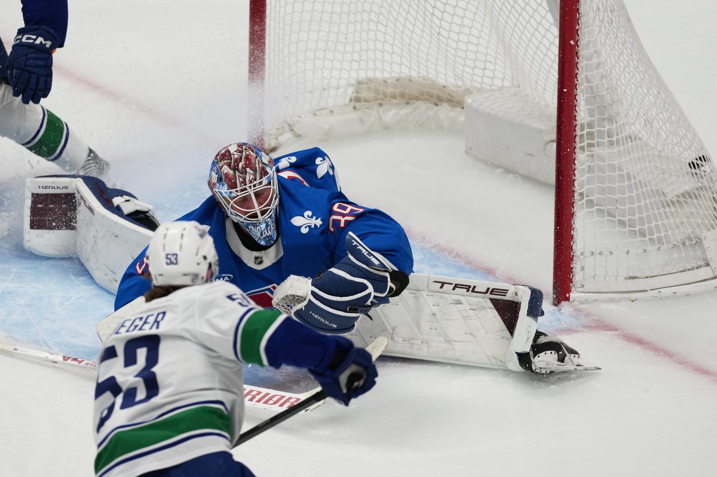 Boeser has hat trick, last-place Canucks overcome blowing 4-goal lead to beat NHL-leading Avs 8-6 | iNFOnews.ca