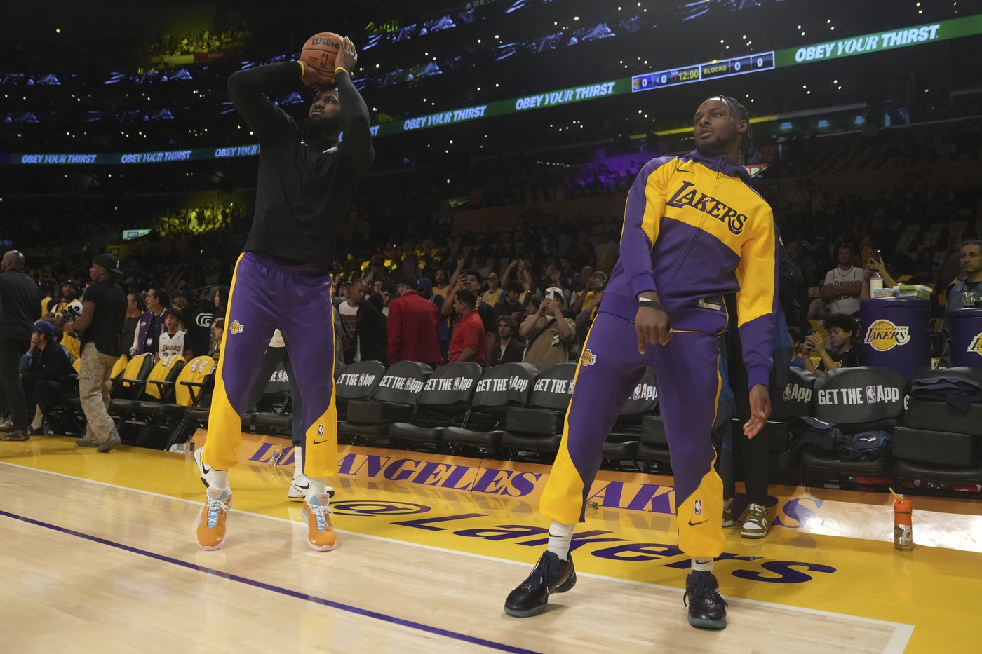 LeBron and Bronny James make history as the NBA's first father-son duo to play together | iNFOnews.ca