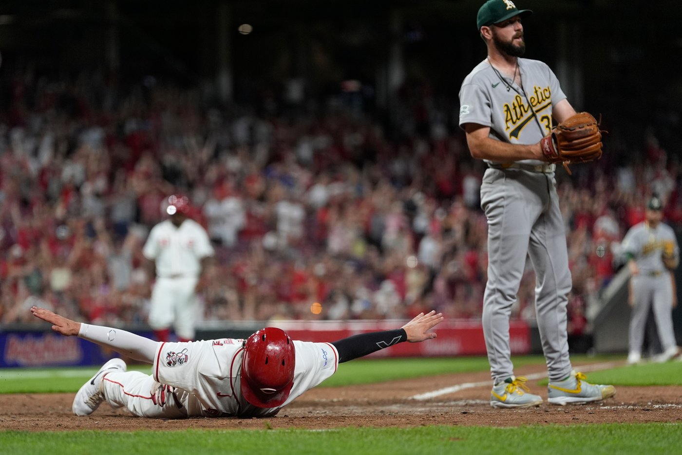 Reds score twice in 8th on wild pitches to beat Athletics 5-4 | iNFOnews.ca Reds score twice in 8th on wild pitches to beat Athletics 5-4 | iNFOnews.ca