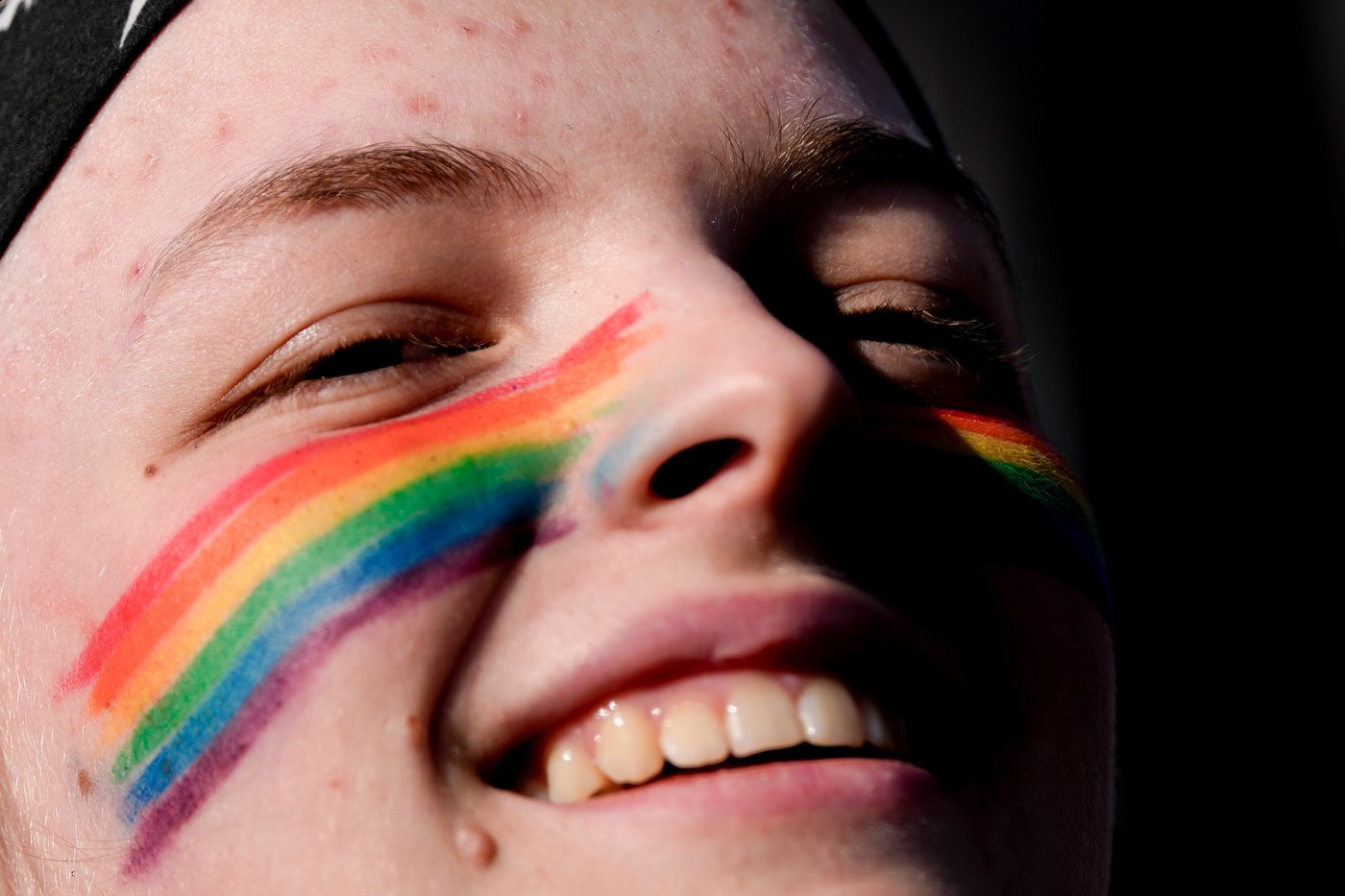 Photos of demonstrators outside the Supreme Court as it considers upholding transgender sports bans | iNFOnews.ca