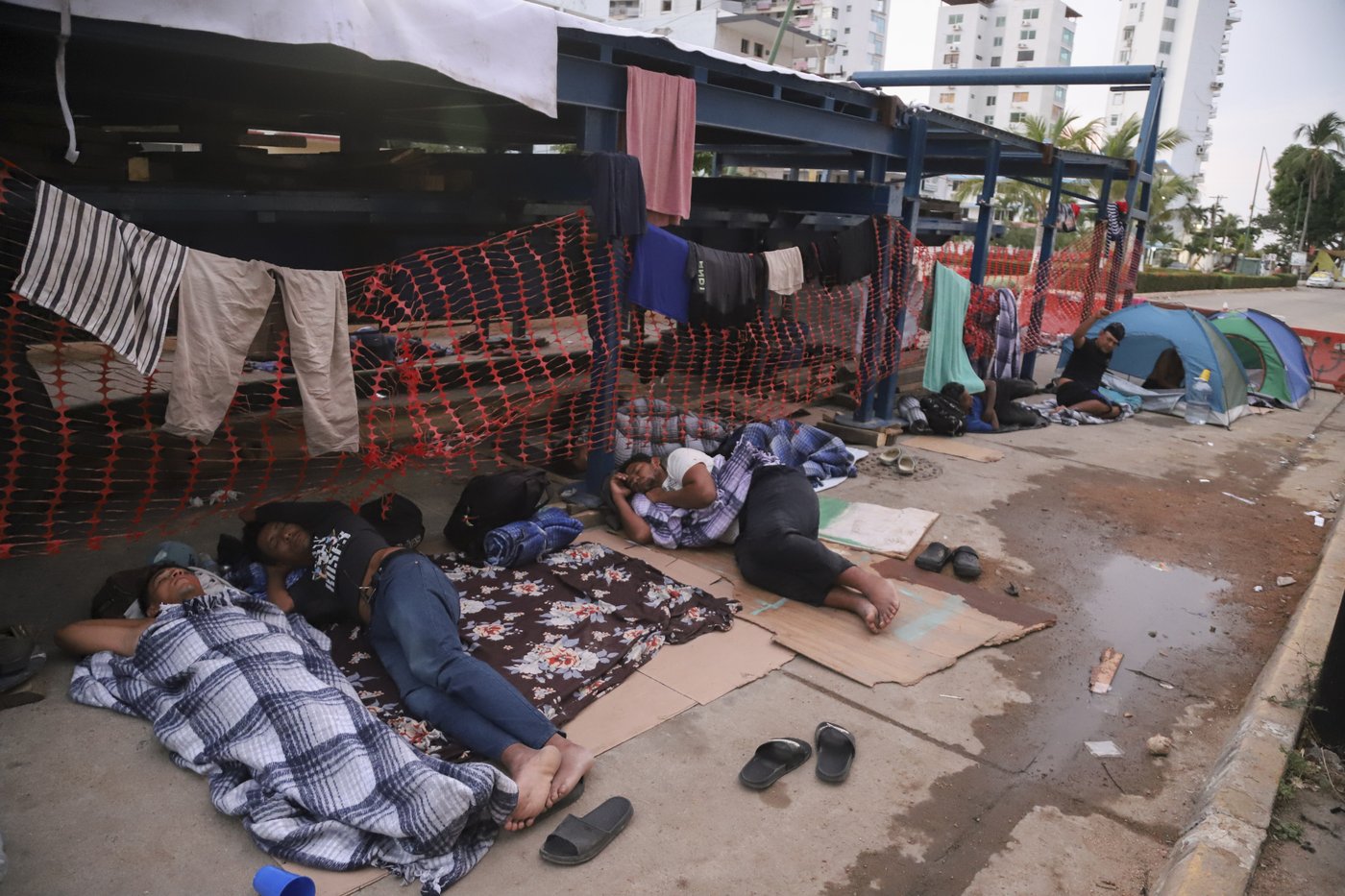 Migrants left stranded in troubled resort as Mexico disperses them far from US border | iNFOnews.ca