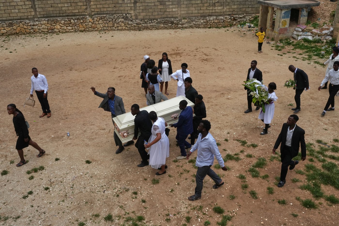 Hundreds attend funeral in Haiti for 4 victims of brutal gang attack that killed 47 | iNFOnews.ca