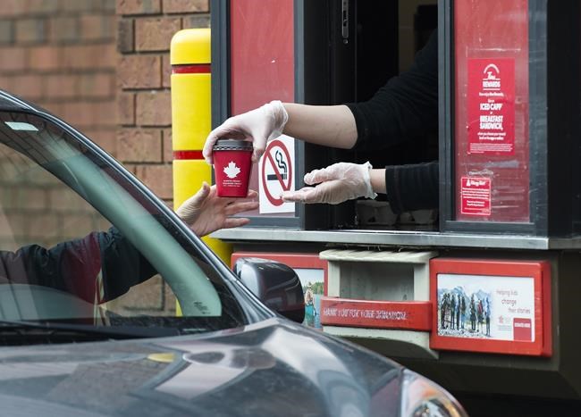 The end of double cupping: Tim Hortons ditches two cups in favour of one with sleeve | iNFOnews.ca The end of double cupping: Tim Hortons ditches two cups in favour of one with sleeve | iNFOnews.ca