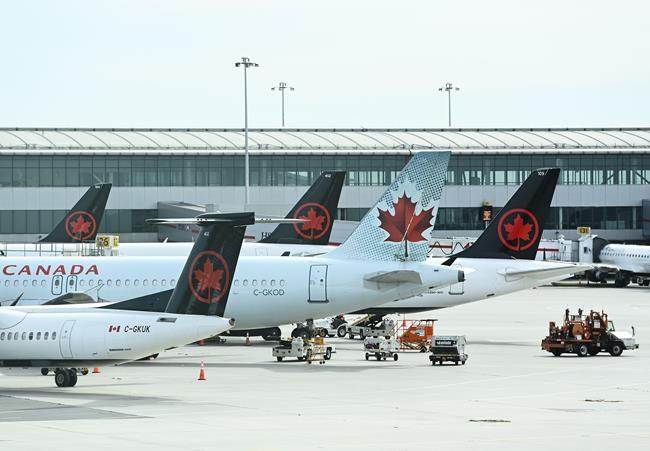 Air Canada suspends flights between Canada, U.K. after warning about new virus strain | iNFOnews.ca