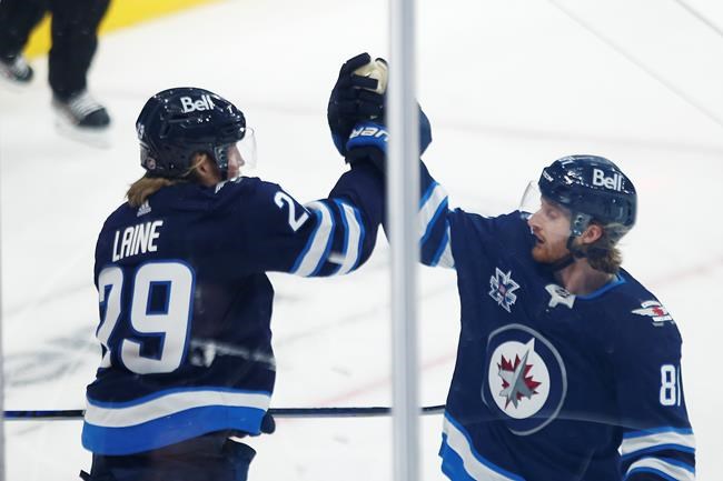 Laine's three-point night earns Winnipeg Jets 4-3 OT win over Calgary Flames | iNFOnews.ca Laine's three-point night earns Winnipeg Jets 4-3 OT win over Calgary Flames | iNFOnews.ca