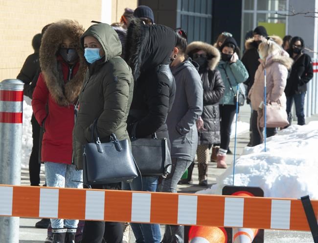 Surging rate of COVID-19 infections eases; health officials warn against complacency | iNFOnews.ca CP1182238569