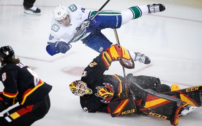Boeser's three-point performance lifts Canucks to 5-1 win over Flames | iNFOnews.ca CP1955444962