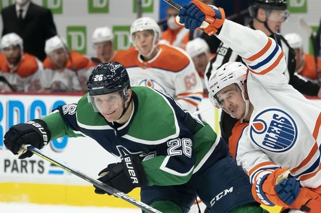 Canucks' Antoine Roussel fined for roughing Oilers' Puljujarvi | iNFOnews.ca
