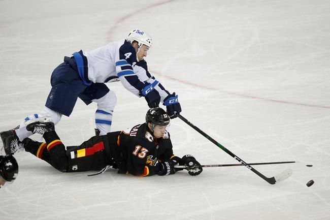 Winnipeg Jets win third straight, down Calgary Flames 3-2 | iNFOnews.ca