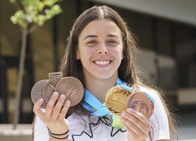 Benfeito gets new Olympic medals to replace three lost in condominium fire | iNFOnews.ca