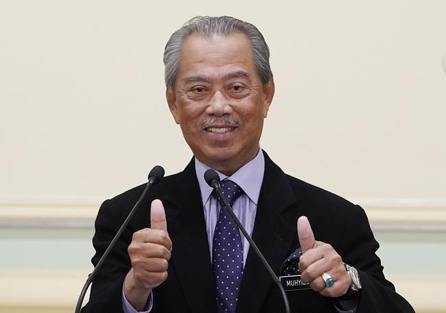 Malaysian PM switches back to real name after court bungle | iNFOnews.ca CP1172882981
