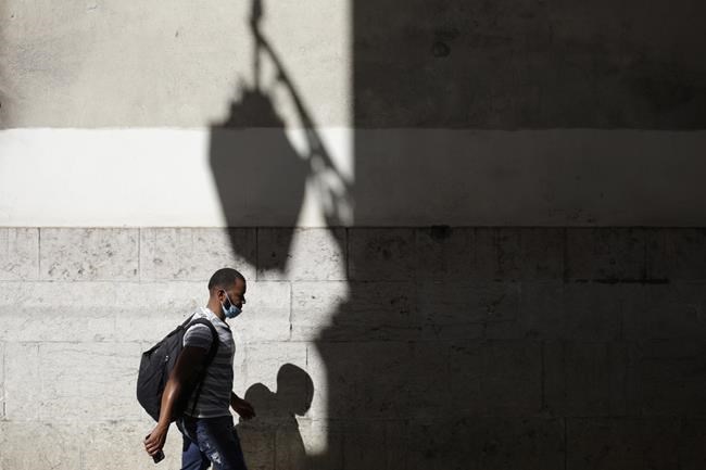 Portugal limits UK travel, stops classes amid virus surge | iNFOnews.ca