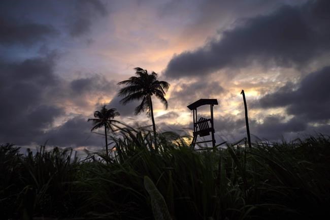 Officials: Storm lashing Florida strengthens into hurricane | iNFOnews.ca