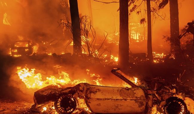 California's largest fire torches homes as blazes lash West | iNFOnews.ca