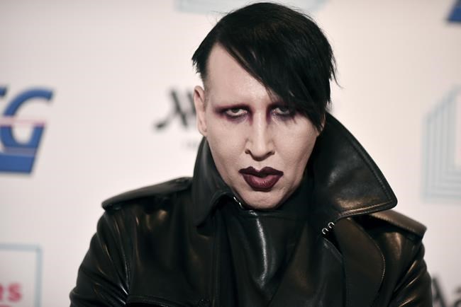 Rocker Manson accused of spitting, blowing snot on woman | iNFOnews.ca