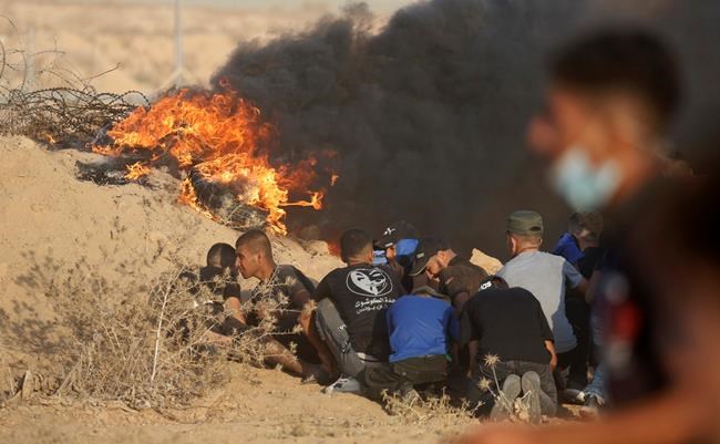 Gaza protesters clash with Israeli troops near the border | iNFOnews.ca Gaza protesters clash with Israeli troops near the border | iNFOnews.ca