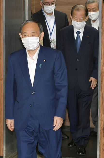 Suga bows out of party vote, paves way for new Japan leader | iNFOnews.ca