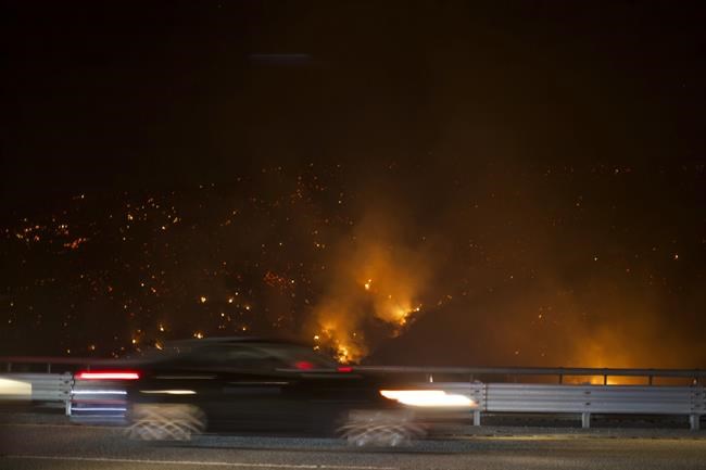 Firefighters advance on blaze that shut California highway | iNFOnews.ca