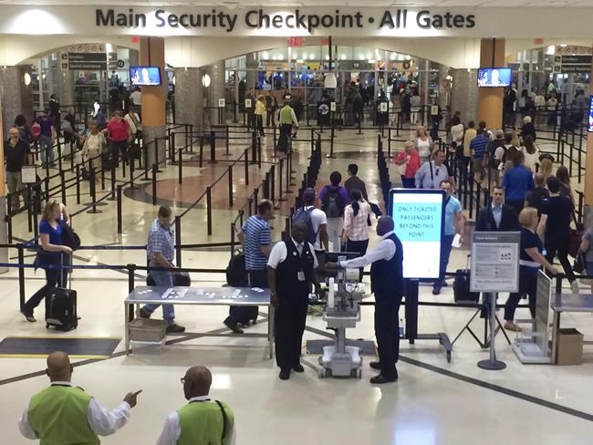 Atlanta airport checkpoint chaos: Man grabs gun, it goes off | iNFOnews.ca