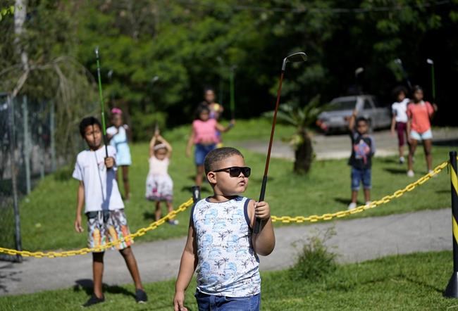 Rio favela seeks to improve kids' lives through golf | iNFOnews.ca