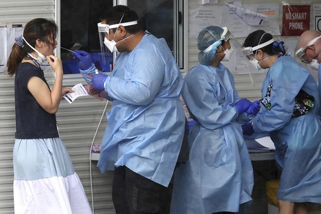 Some virus restrictions back in Australia as omicron surges | iNFOnews.ca Some virus restrictions back in Australia as omicron surges | iNFOnews.ca