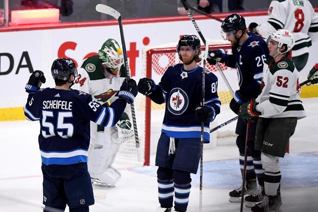 Connor Hellebuyck stars in third shutout of the season as Jets beat Wild 2-0 | iNFOnews.ca