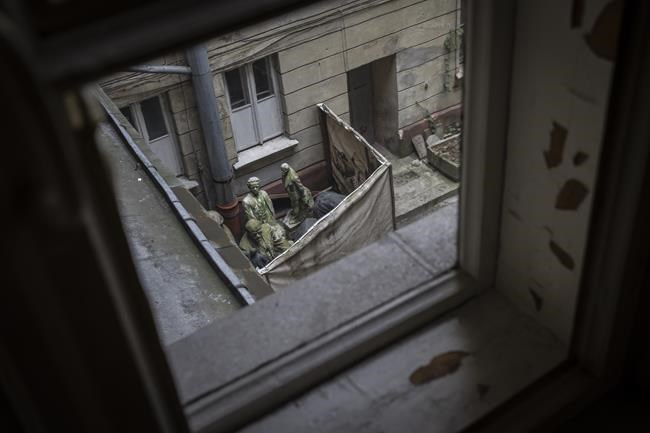 AP PHOTOS: Day 11, death on Ukraine's bombarded streets | iNFOnews.ca