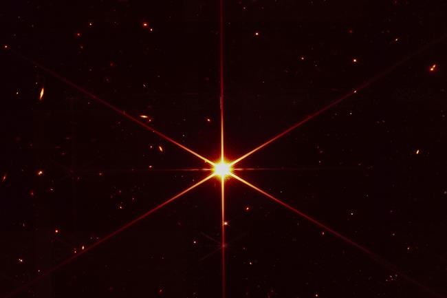 Space telescope's image of star gets photobombed by galaxies | iNFOnews.ca