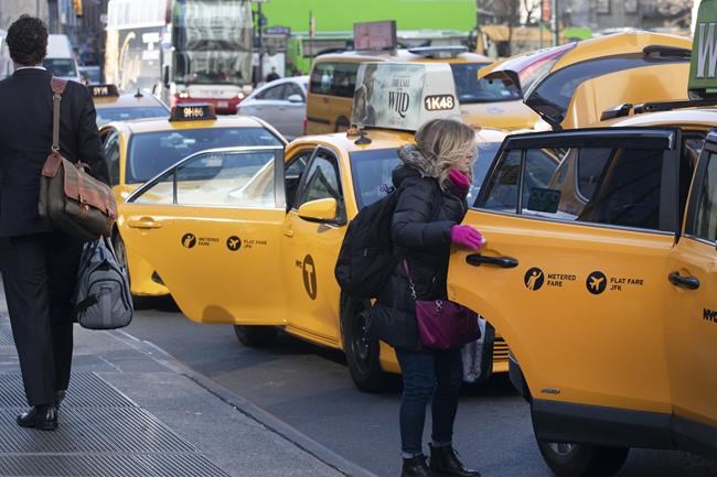 After years of rivalry, Uber puts NYC taxi cabs on its app | iNFOnews.ca CP241024438
