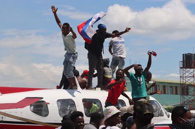 Haitians protest rising insecurity; some burn a plane | iNFOnews.ca