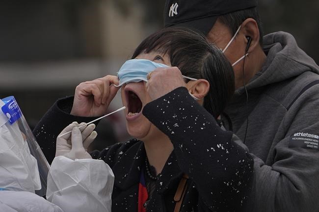 Shanghai to allow parents to stay with COVID-infected kids | iNFOnews.ca CP580764298
