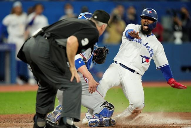 Hernández leads Blue Jays to wild 10-8 win in Toronto's first home opener since 2019 | iNFOnews.ca CP26094862