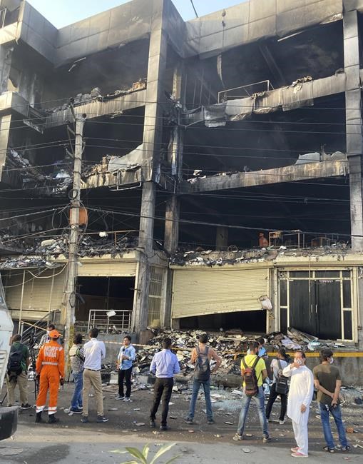 Police arrest 2 after building fire kills 27 in New Delhi | iNFOnews.ca Police arrest 2 after building fire kills 27 in New Delhi | iNFOnews.ca