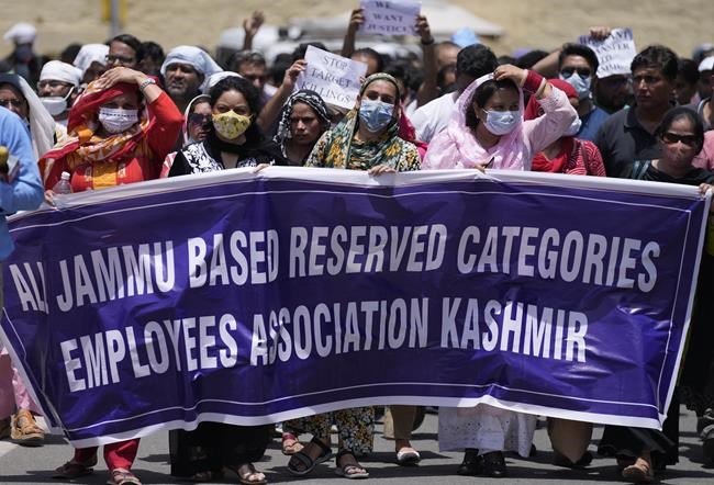Hindu banker and a worker from India fatally shot in Kashmir | iNFOnews.ca