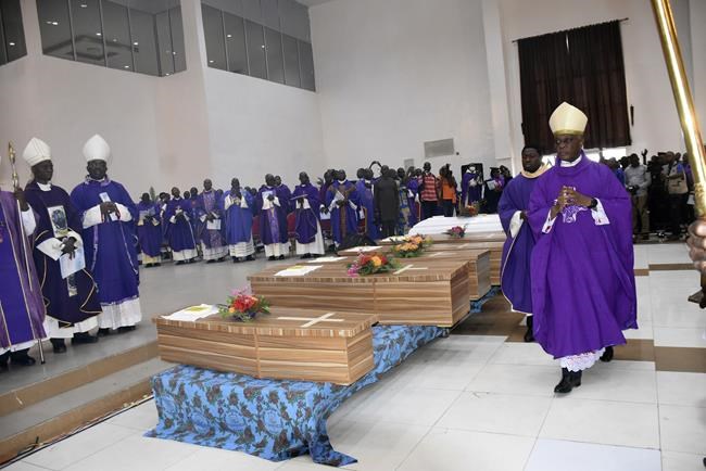 Nigeria funeral for church attack victims draws anger, tears | iNFOnews.ca