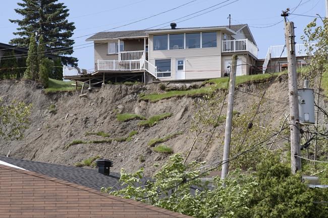 Quebec premier visits Saguenay, Que., area under threat of landslides, promises aid | iNFOnews.ca