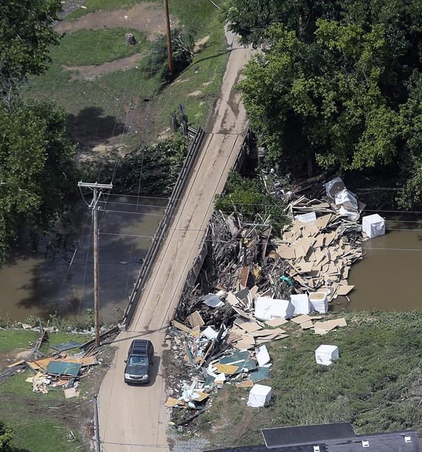 Some Appalachia residents begin cleanup after deadly floods | iNFOnews.ca