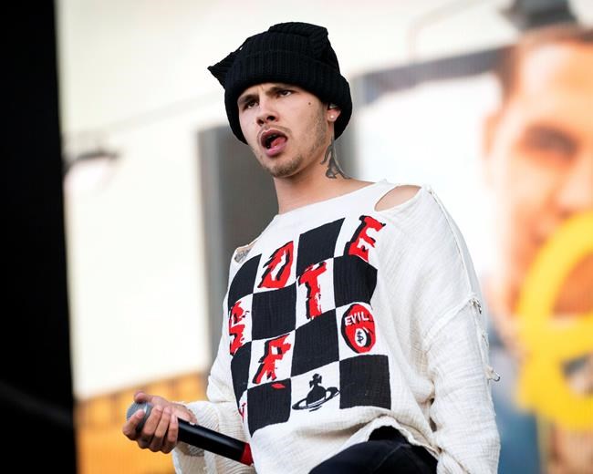 Osheaga apologizes after rapper appears in swastika T-shirt at music festival | iNFOnews.ca CP517269957