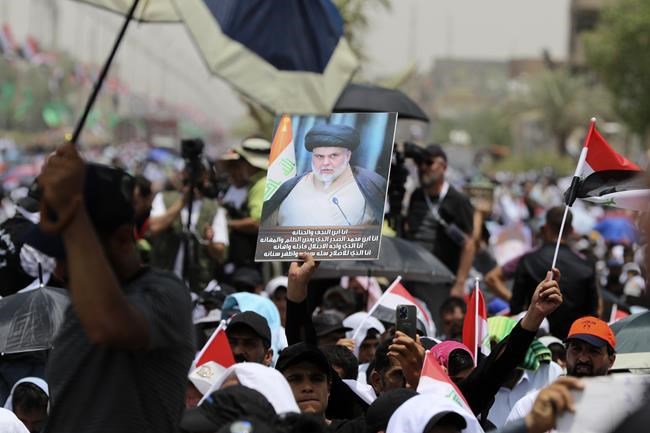 Iraq Shiite cleric behind parliament sit-in steps up demands | iNFOnews.ca CP1809098371