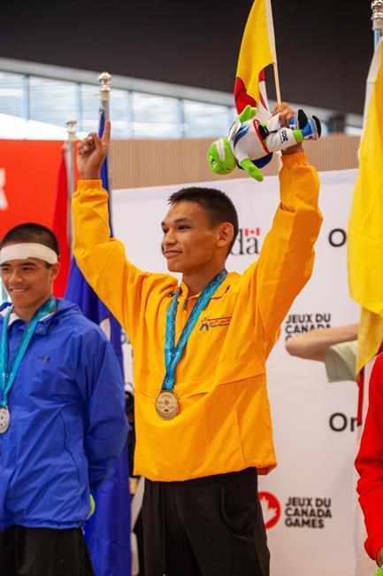 Wrestler Eekeeluak Avalak dedicates historic Canada Games gold to his late brother | iNFOnews.ca