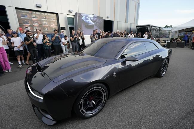 Gas-powered muscle cars drive into the sunset, turn electric | iNFOnews.ca CP588676623