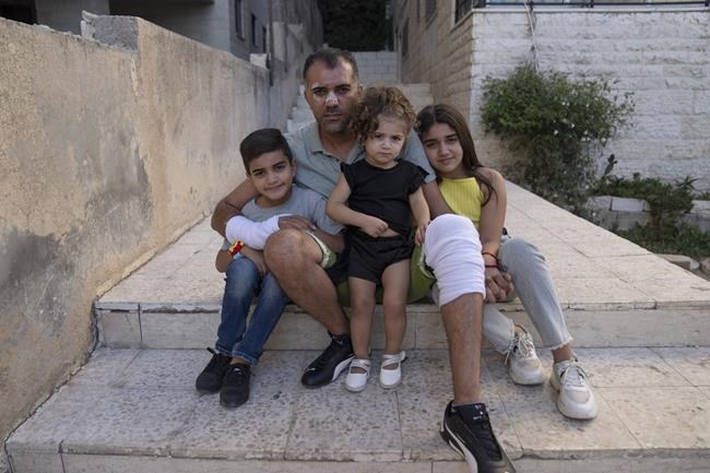 Palestinian man left beaten, bloodied by Israeli police | iNFOnews.ca CP848025120