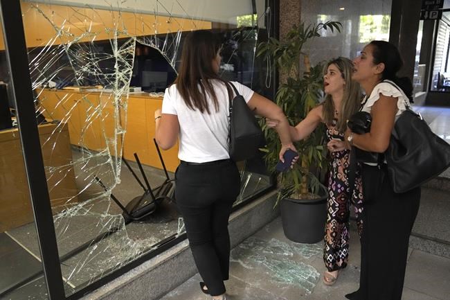 Woman with toy gun grabs trapped savings from Beirut bank | iNFOnews.ca Woman with toy gun grabs trapped savings from Beirut bank | iNFOnews.ca