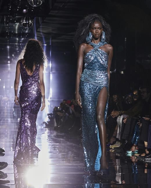 Tom Ford closes Fashion Week with big hair, miles of sparkle | iNFOnews.ca