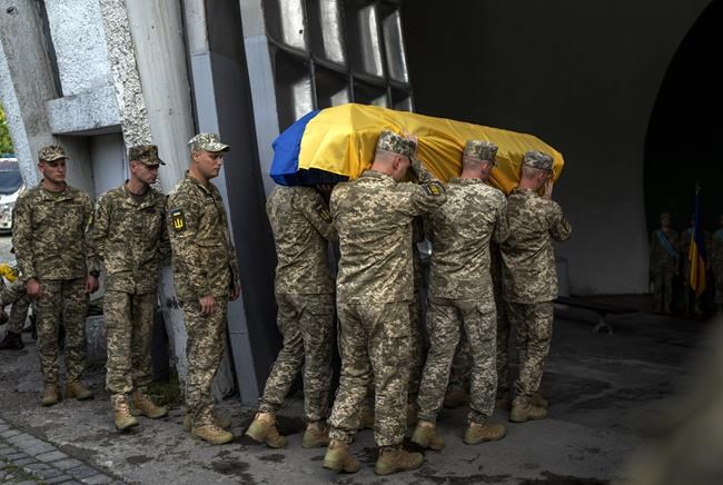 Ukraine pays tribute to Russian woman who fought on its side | iNFOnews.ca Ukraine pays tribute to Russian woman who fought on its side | iNFOnews.ca