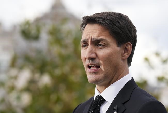 Video shows Trudeau singing Queen anthem 'Bohemian Rhapsody' ahead of queen's funeral | iNFOnews.ca