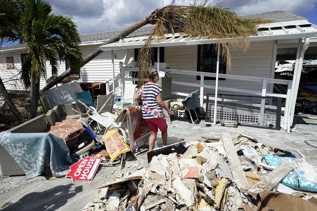 Ian evacuees return to mud, rubble as death toll hits 101 | iNFOnews.ca Ian evacuees return to mud, rubble as death toll hits 101 | iNFOnews.ca